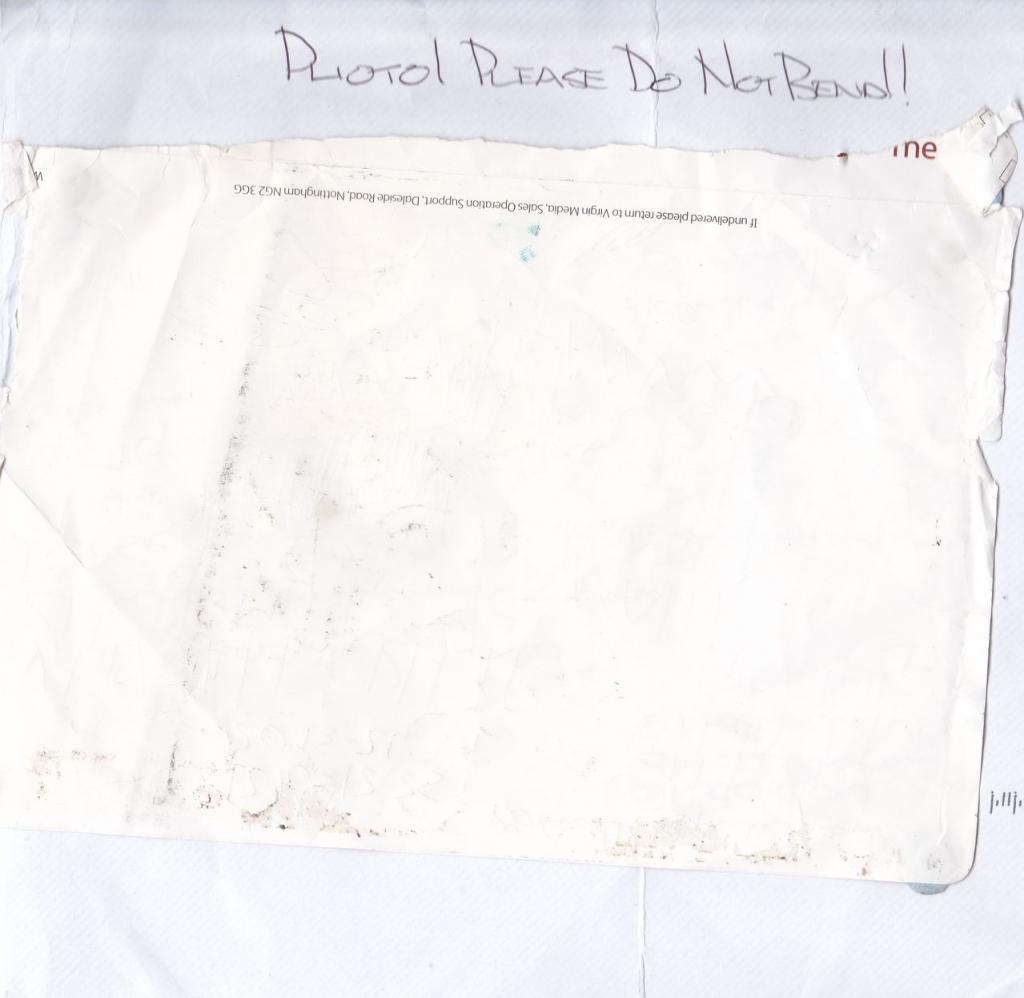 Olga_Kurylenko_Envelope.jpg